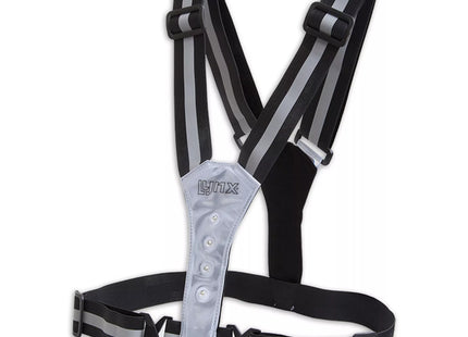 a black and white striped harness with a white strap