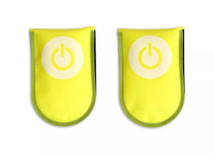 a pair of yellow gloves with a power button on them