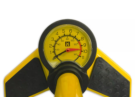 a yellow and black pressure gauge on a white background